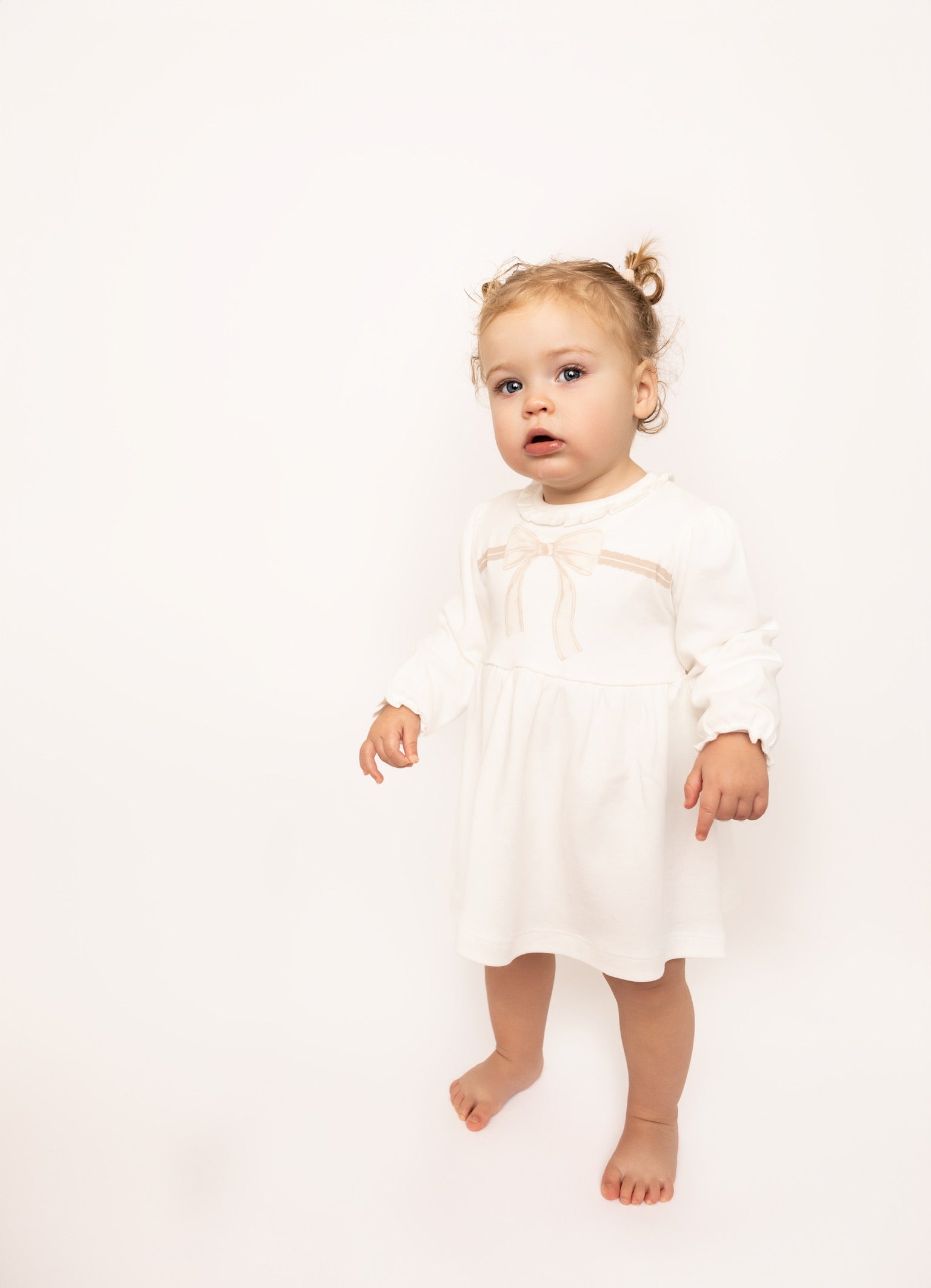 Ecru-stone dress with bow headband